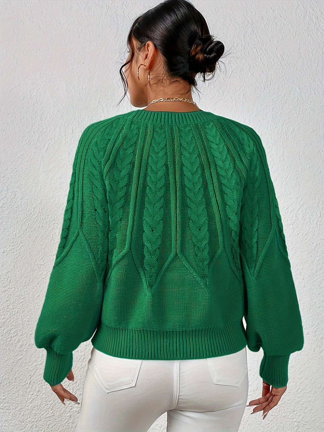Women's cozy cable knit top, relaxed fit, comfortable long lantern sleeves for winter.
