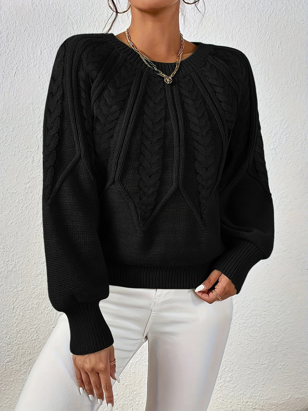 Perfect women's winter sweater: cable knit, relaxed fit, stylish lantern sleeves.