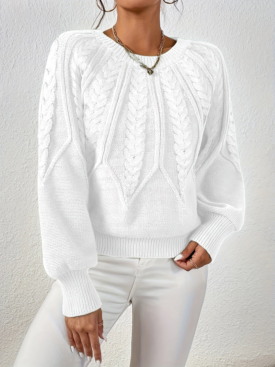 Everyday comfortable women's cable knit sweater, relaxed fit, distinctive lantern sleeves.