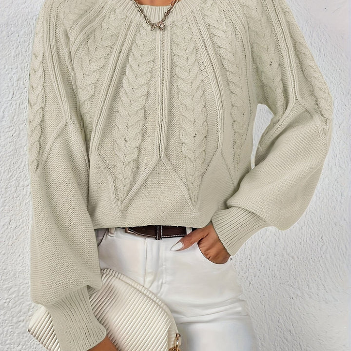 Women's long sleeve cable knit top, relaxed fit, luxurious feel, with lantern sleeves.