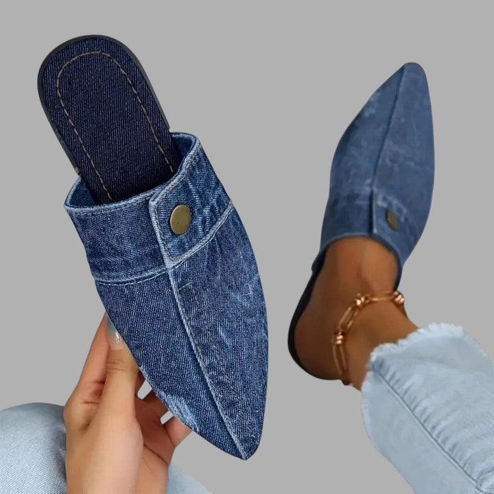 Stylish flat mule sandals for women, offering easy slip-on convenience and a chic casual look.