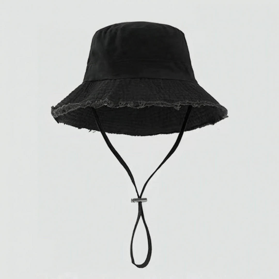 Travel-friendly women's bucket hat, foldable, adjustable strap, for sun protection & casual wear.
