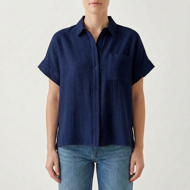 Lightweight women's short sleeve casual shirt. Button-down design for effortless style and everyday summer comfort.