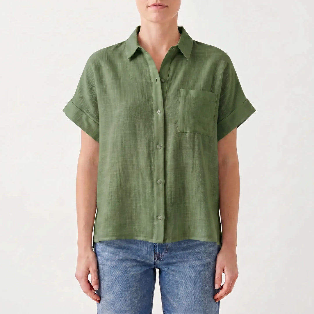 Effortless style with this women's casual button-down shirt. Short sleeve, relaxed fit, lightweight for summer comfort.