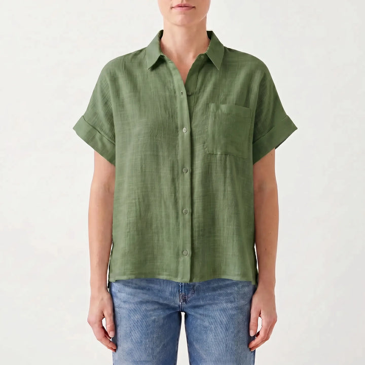 Effortless style with this women's casual button-down shirt. Short sleeve, relaxed fit, lightweight for summer comfort.