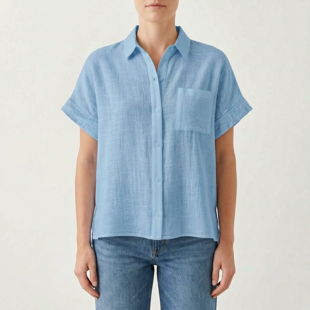 Comfortable women's casual short sleeve top. This relaxed fit button-down shirt is perfect for everyday summer style.