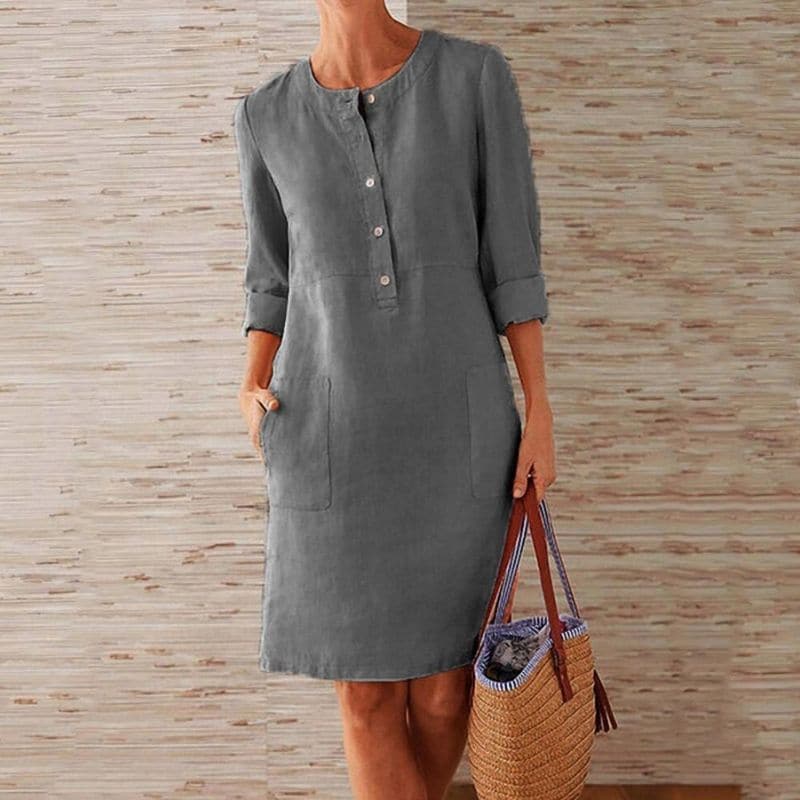 Everyday women's midi shift dress with full button front & side pockets, perfect for casual spring/summer comfort.