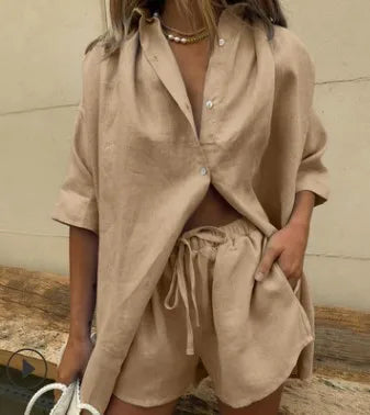 Stylish women's two-piece shorts set featuring a button-up shirt & elastic waist shorts. Ideal for coordinating summer outfits.