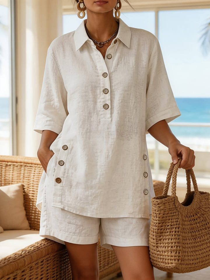 Stylish women's coordinated collared top and shorts set with button detail, ideal for warm weather and resort wear.