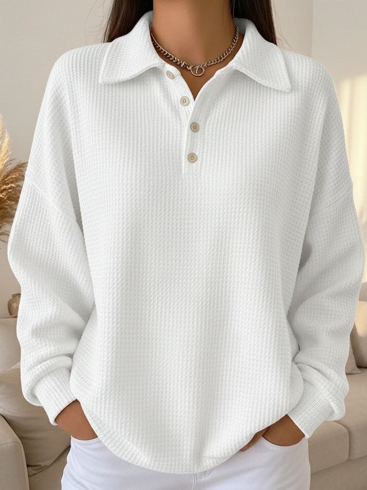 Chic women's casual Henley sweater featuring a smart collar. A comfortable, long-sleeve pullover for fall fashion.