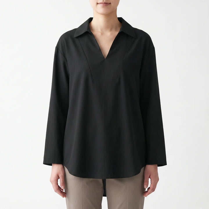 Versatile women's high-low tunic blouse, perfect for smart casual spring & fall outfits. Comfortable long sleeve top.