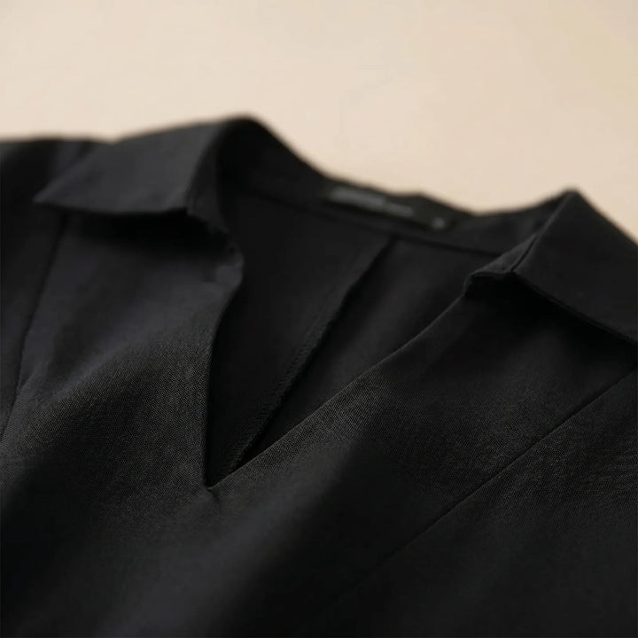 Loose fit women's tunic top, high-low hem & long sleeves. Comfortable v-neck blouse for casual wear & everyday style.