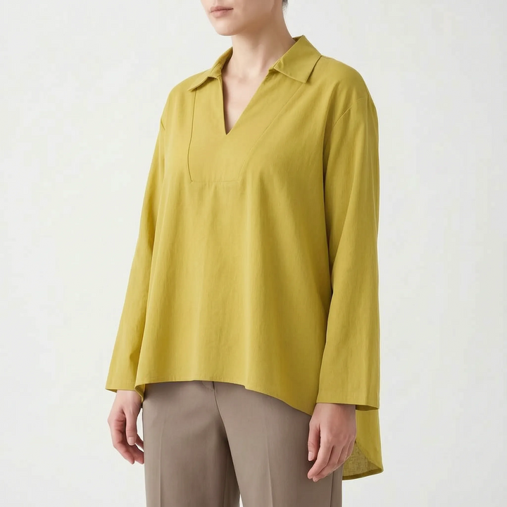 Fashionable women's high-low tunic for spring & fall. Long sleeve V-neck blouse, versatile smart casual top.