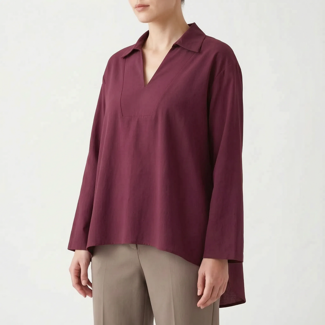 V-neck women's high-low tunic top. Long sleeve casual blouse, loose fit for comfortable, versatile everyday wear.