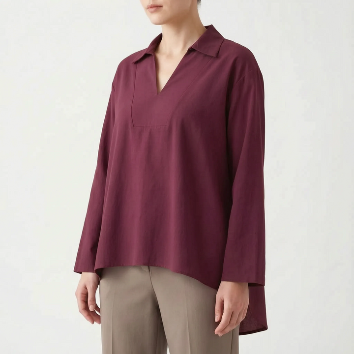V-neck women's high-low tunic top. Long sleeve casual blouse, loose fit for comfortable, versatile everyday wear.