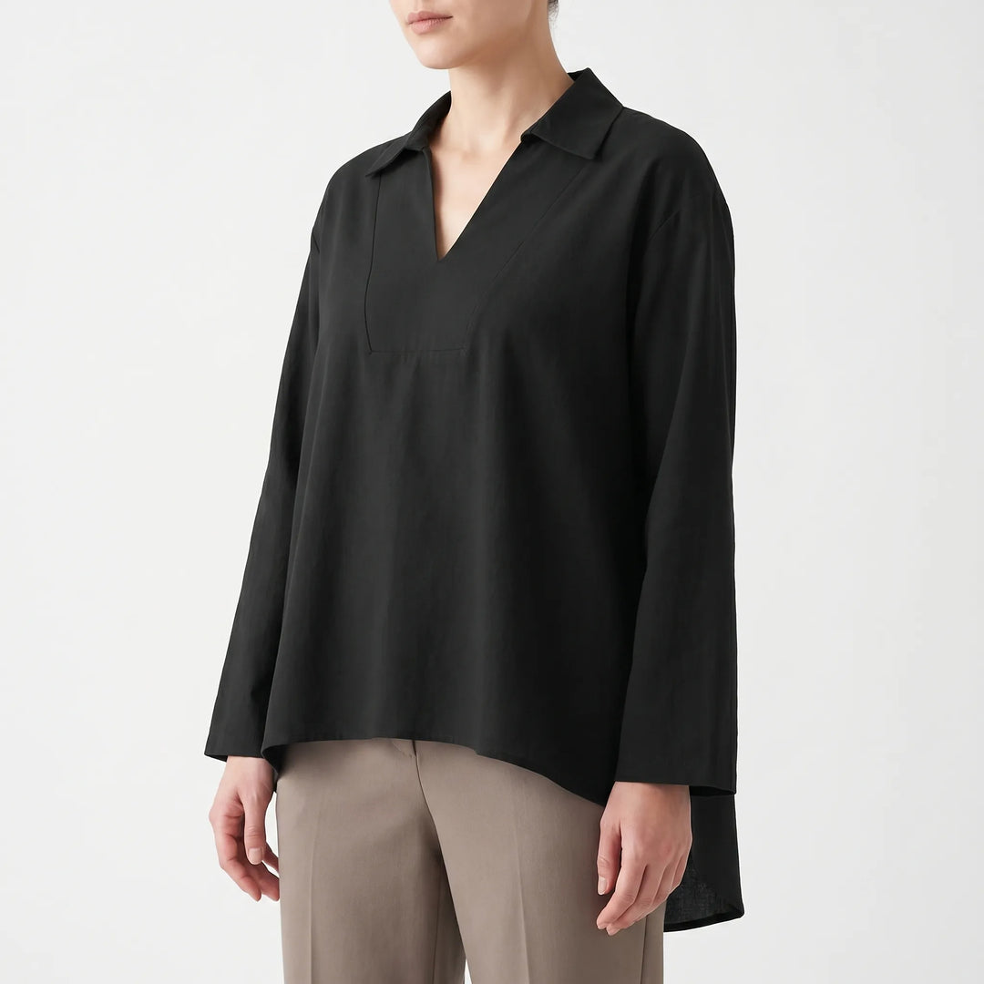 Effortless women's casual high-low tunic top. Loose fit, long sleeve v-neck blouse for versatile everyday style.