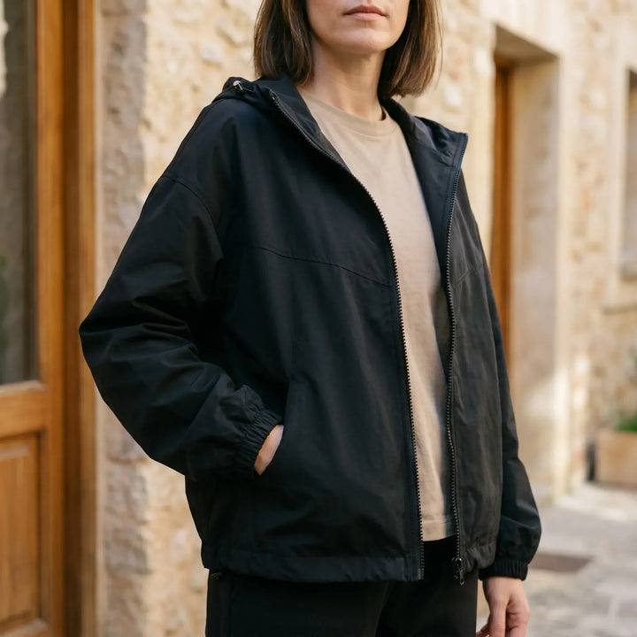 Women's casual hooded windbreaker jacket, perfect lightweight outerwear for spring & fall, with full zipper closure.