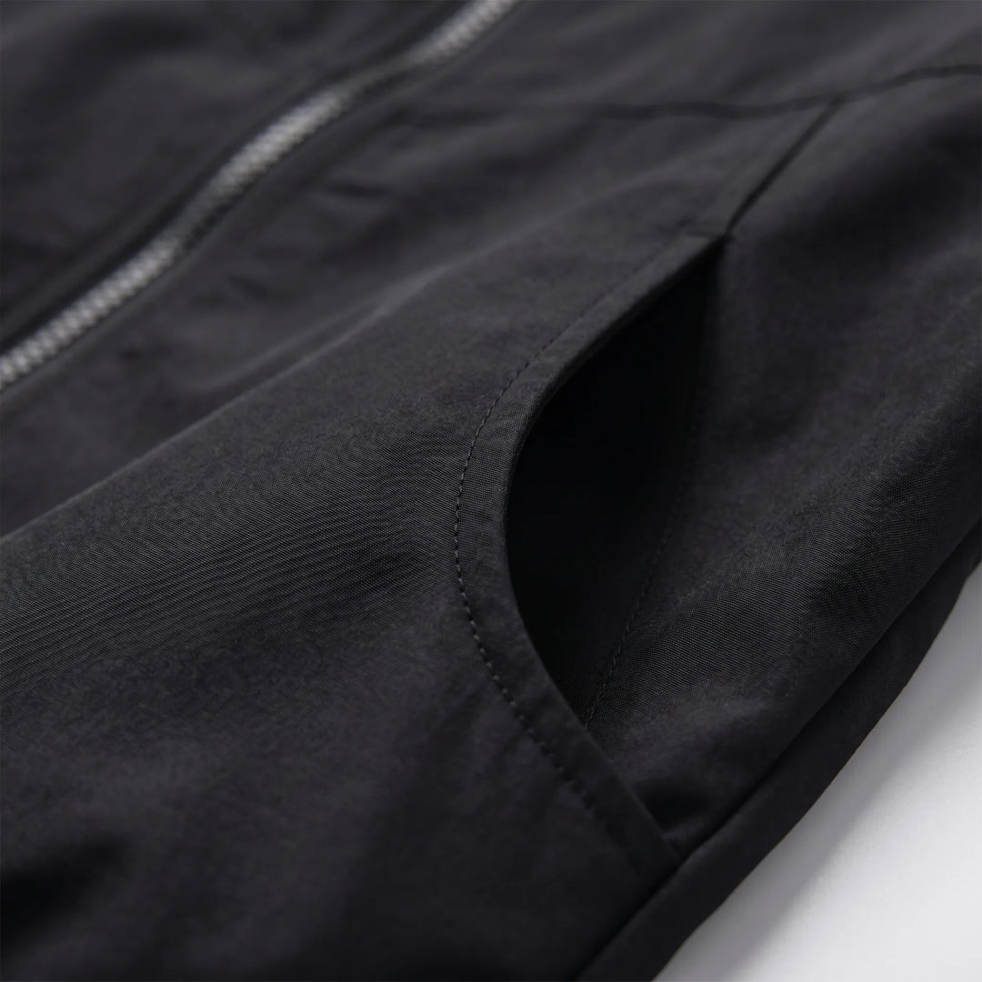 Lightweight women's casual windbreaker with a protective hood & zipper. Great for layering in spring & fall weather.