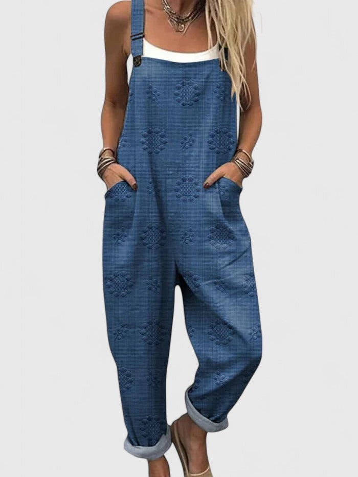 Women's casual jumpsuit with vibrant floral embroidery & practical pockets, perfect for summer comfort.