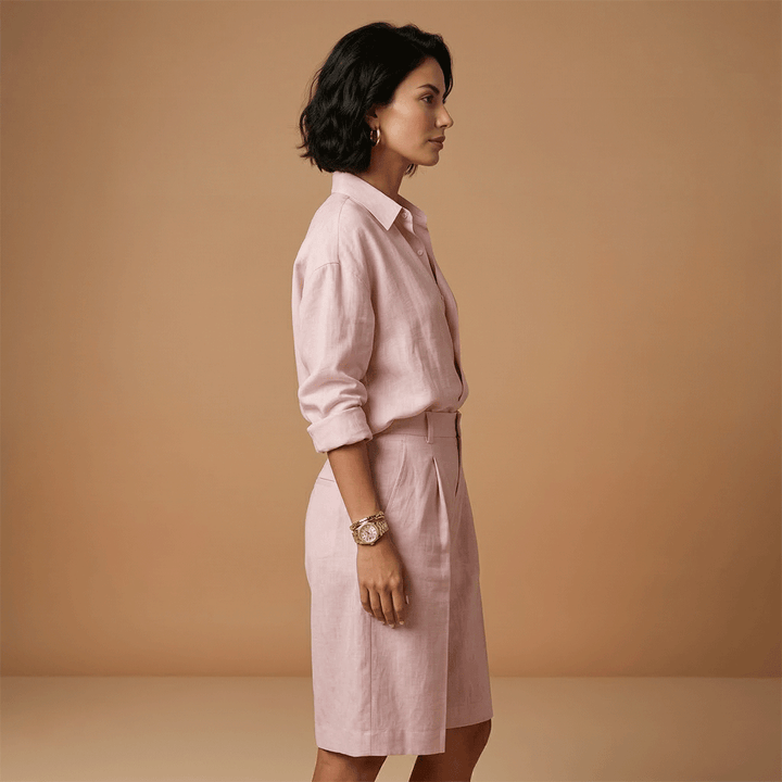 Stylish women's long sleeve shirt and shorts casual outfit for travel, comfort, and summer fashion.