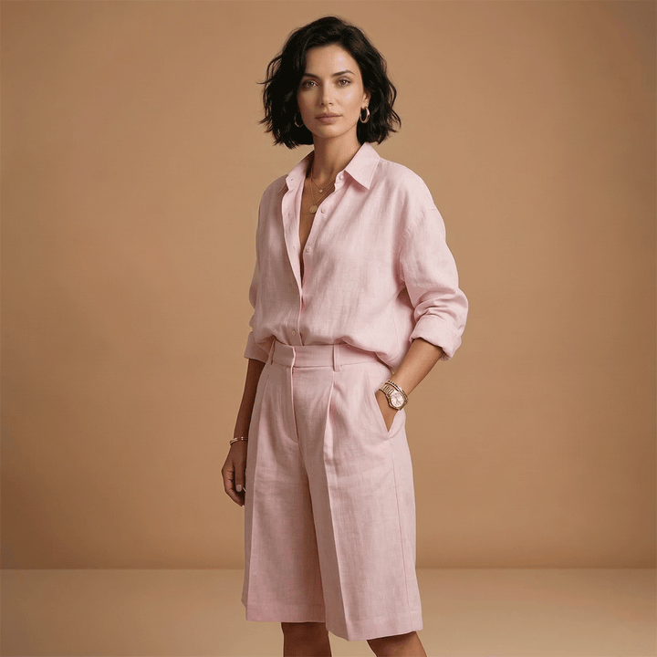 Matching women's long sleeve top & high rise shorts set, a comfortable casual outfit for any occasion.