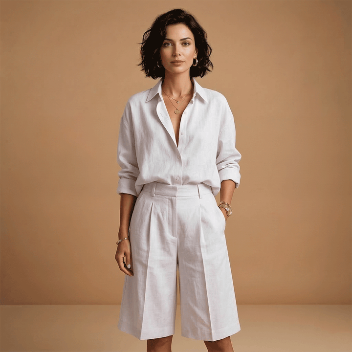 Women's comfortable casual set featuring a long sleeve top and pleated high-rise shorts.