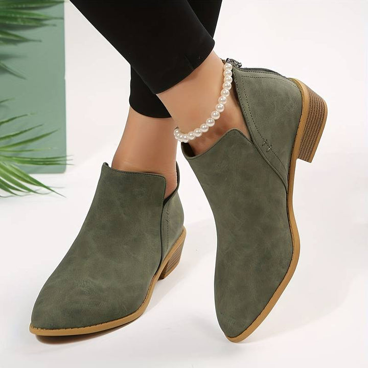 Women's casual low heel slip-on ankle boots in a versatile color, perfect for everyday effortless style.