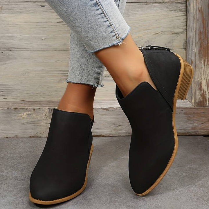 Effortless style women's low heel slip-on boots, ideal for comfortable and chic everyday wear.
