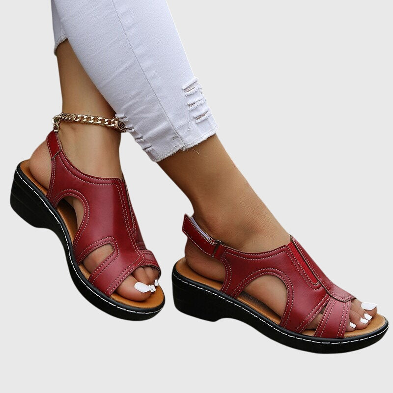 Close-up of the peep toe & slingback strap on women's casual wedge sandals. Summer comfort & style.