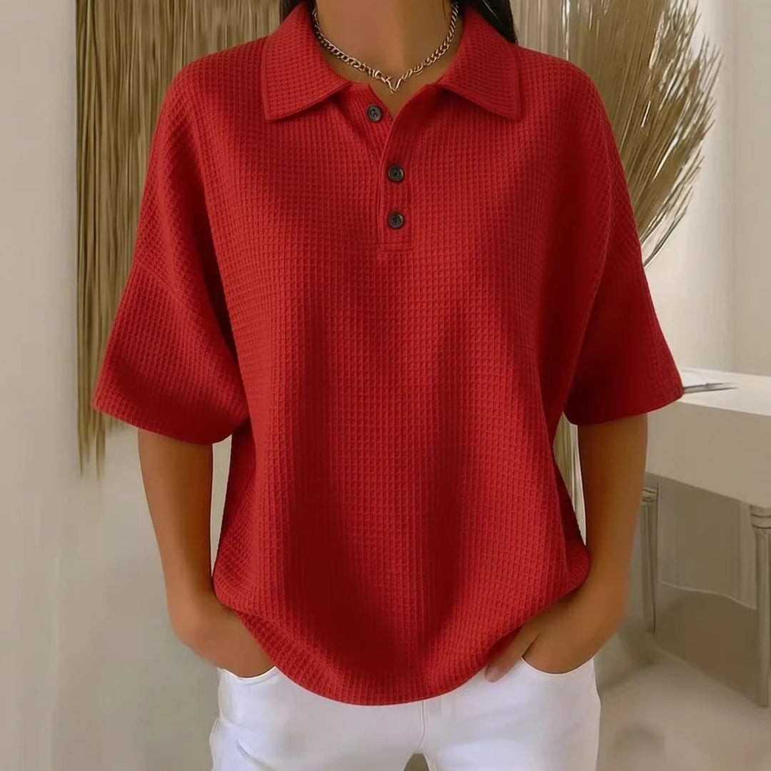 Women's casual polo neck blouse with a loose fit & short sleeves. Perfect for everyday spring & summer style.