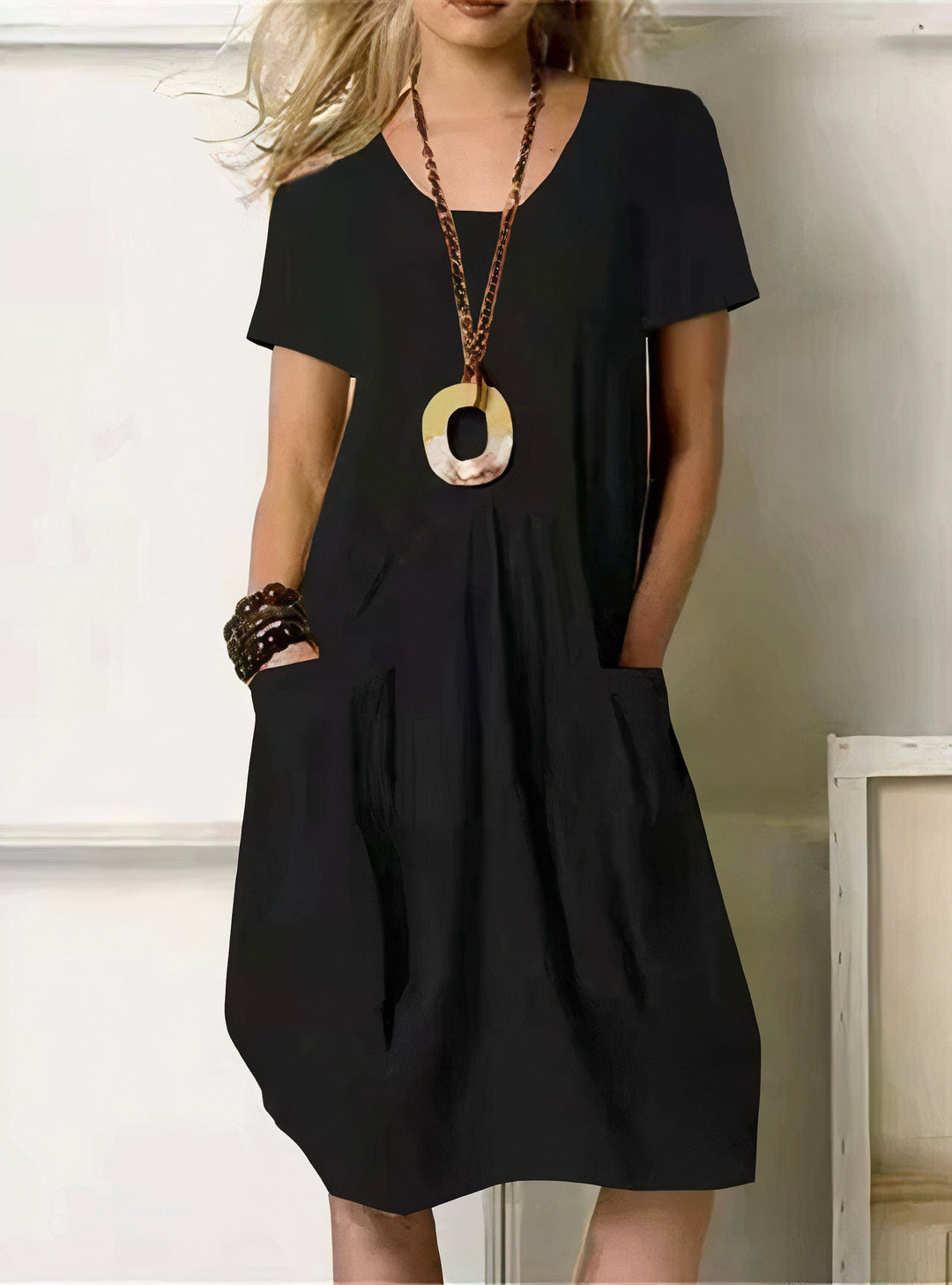 Flattering women's summer/spring dress, a comfortable casual style with a relaxed fit for easy everyday wear.