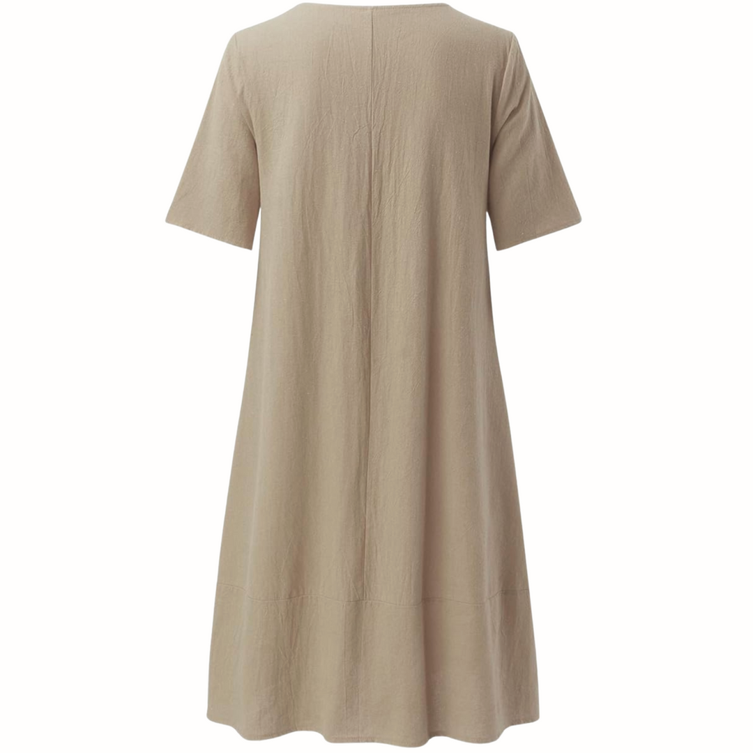 Stylish women's casual dress, relaxed fit & flattering for everyday comfort. Versatile for spring & summer.