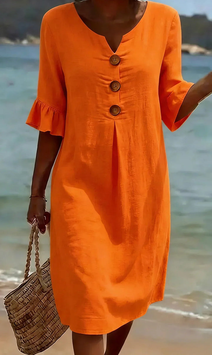 Comfortable women's relaxed fit midi dress with ruffle sleeves & button-front closure. Perfect for summer days.