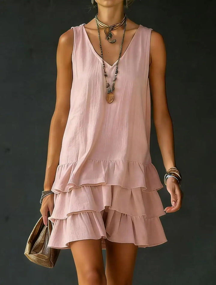 Women's casual ruffle tiered mini dress, sleeveless V-neck, perfect for summer days or vacation wear.