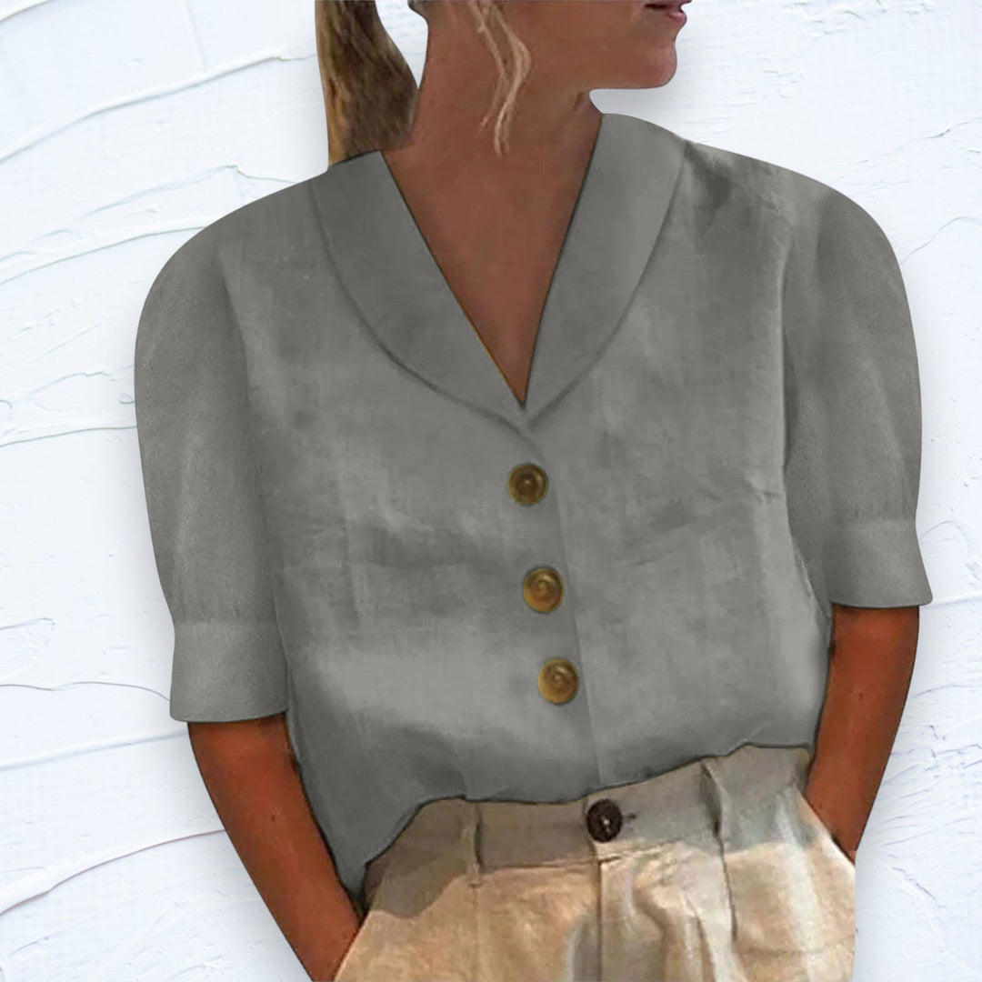 Versatile women's relaxed fit shirt with short sleeves & button front. Great for casual summer everyday wear.