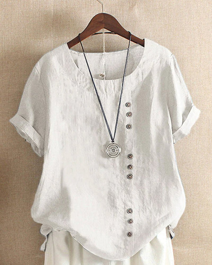 Relaxed fit women's short sleeve button-front top, ideal for spring outfits & versatile summer style.