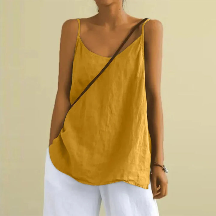Stylish women's summer cami top with a loose, comfortable fit. Essential sleeveless top for warm casual days.