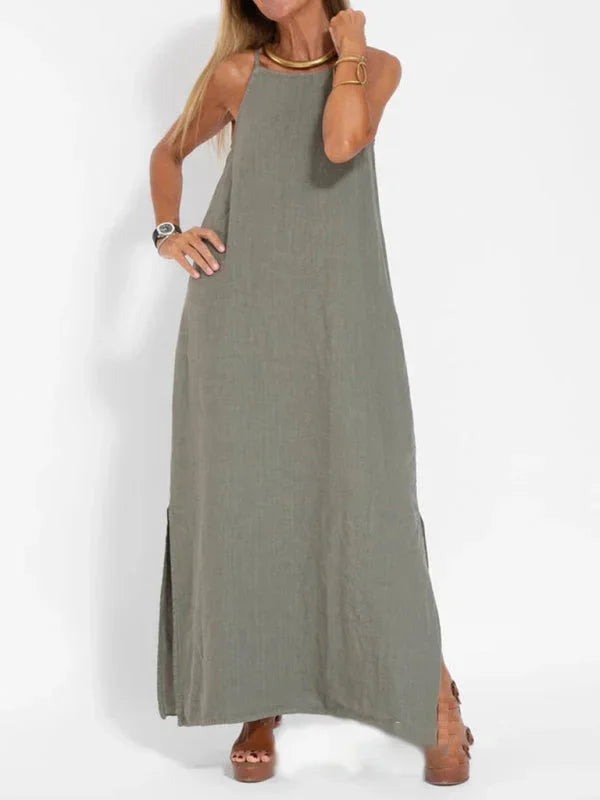 Women's casual sleeveless maxi dress with side slit, perfect for summer vacation.