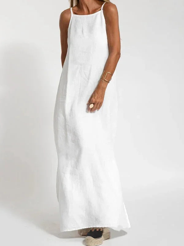 Stylish women's sleeveless maxi dress, featuring a flowy silhouette and side slit detail.