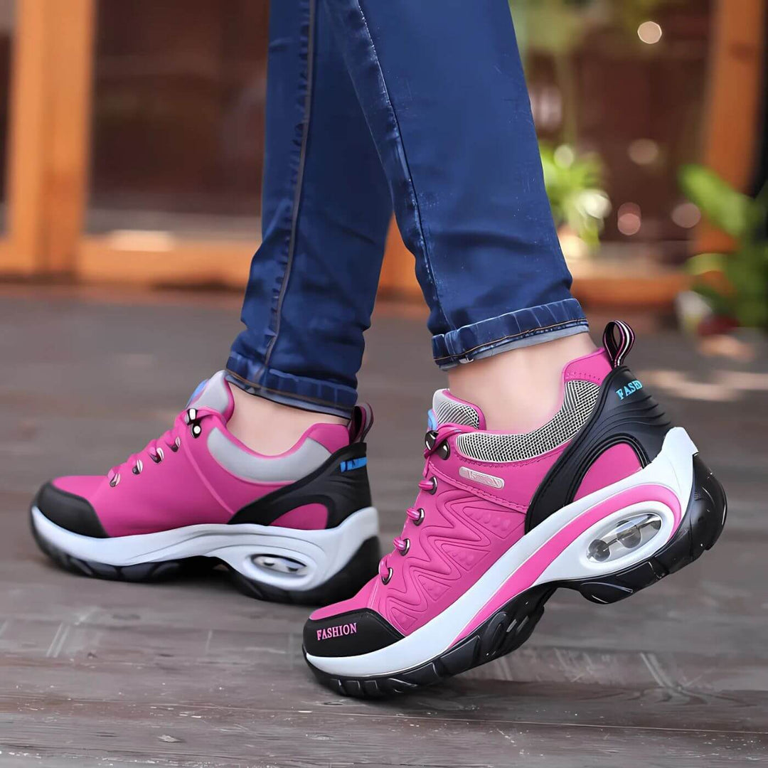 Pink women's casual walking sneakers, featuring arch support & breathable design for daily comfort.