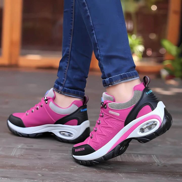 Pink women's casual walking sneakers, featuring arch support & breathable design for daily comfort.