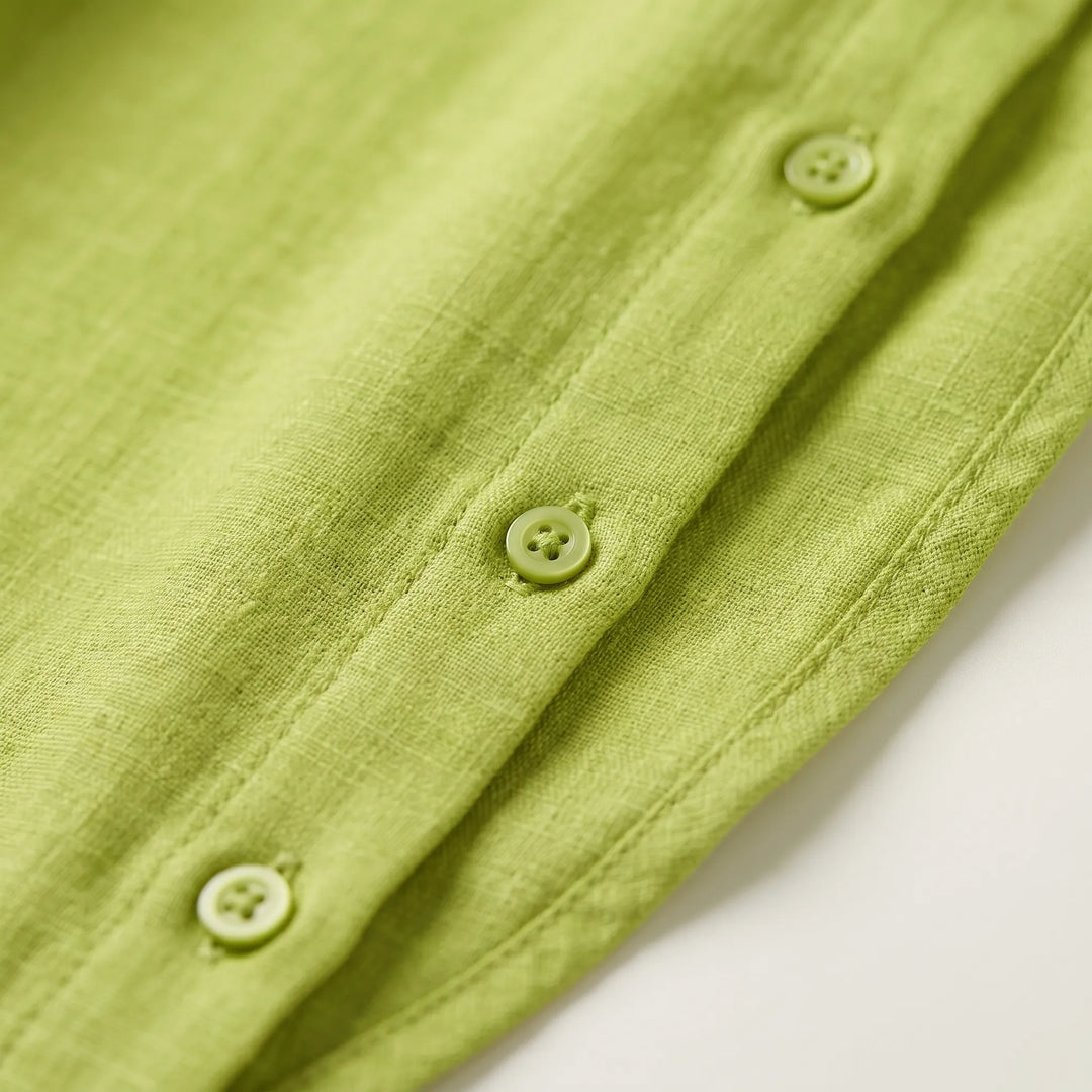 Stylish women's collared blouse with long roll-up sleeves, ideal for casual spring & summer fashion.