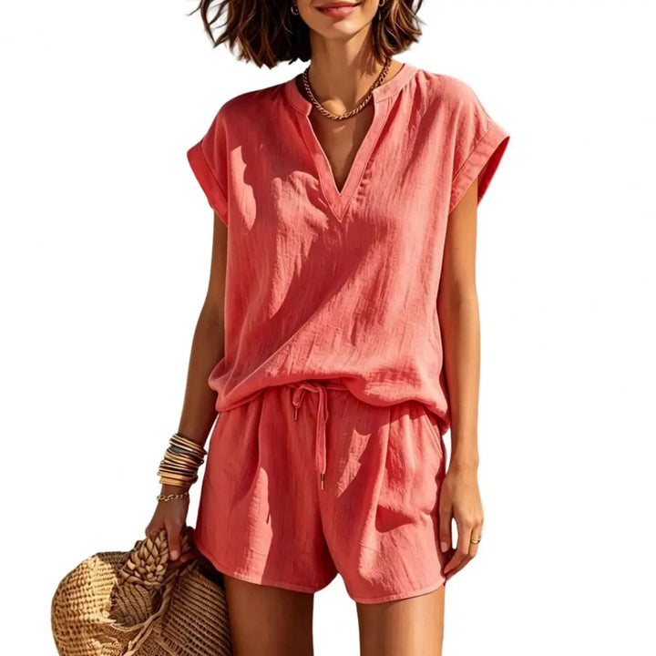 Versatile women's summer co-ord set. Comfy V-neck top & drawstring shorts. Casual two-piece linen look for vacation.