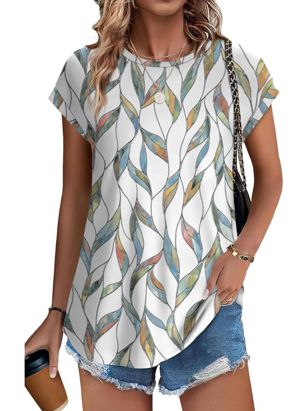 Women's casual top with stylish leaf print & crew neck. Perfect for relaxed summer fashion.