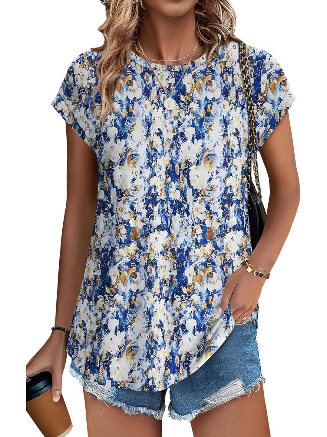 Trendy women's casual top with a stylish leaf print. Essential for spring and summer fashion.
