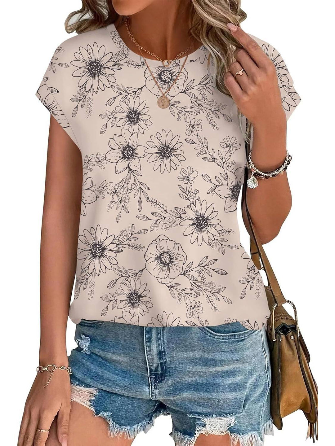 Boho-inspired leaf print women's casual top with a classic crew neck. Relaxed fit.