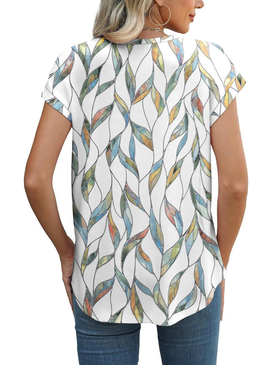 Women's casual blouse with a vibrant leaf print, ideal for everyday and warm weather.