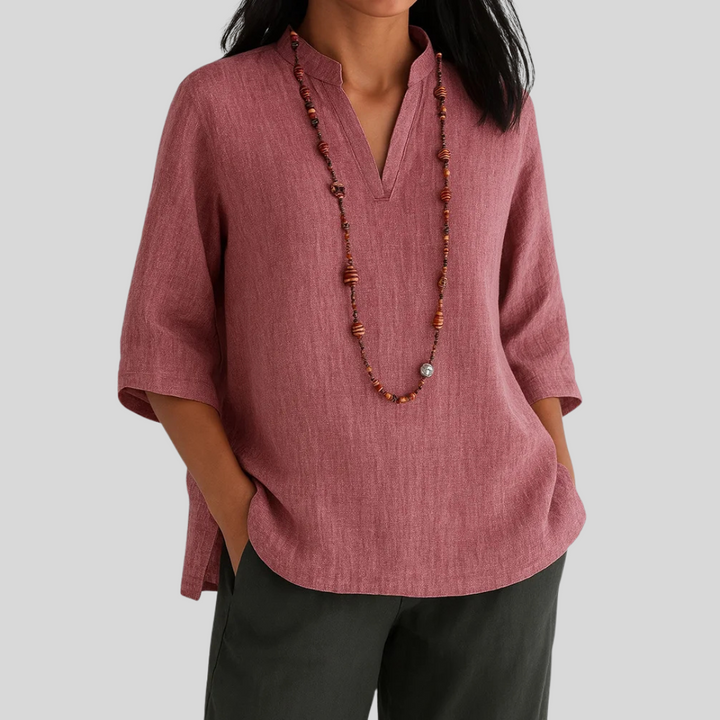 Versatile women's 3/4 sleeve V-neck blouse in a relaxed fit. Perfect for casual or smart casual styles.