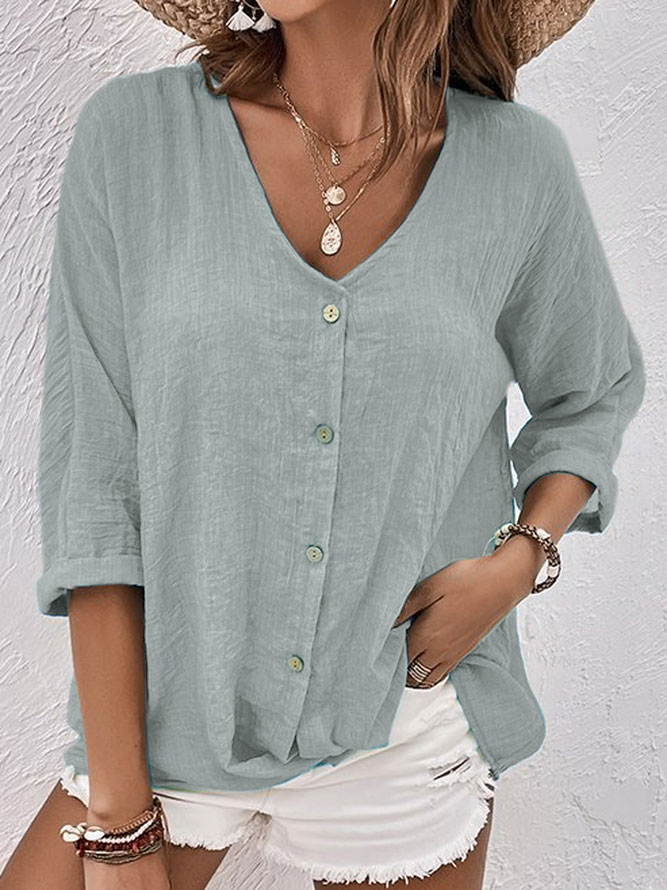 Spring/Summer women's V-neck button down shirt, a comfy long sleeve casual top perfect for warm weather fashion.