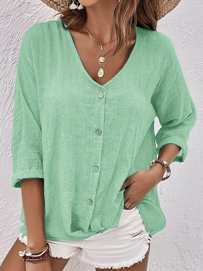 Comfortable women's V-neck button down shirt, a soft long sleeve casual blouse for effortless everyday style.